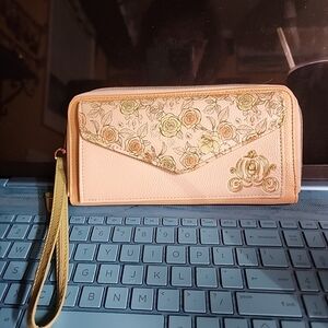 Disney Cinderella Carriage Wristlet New without tag BUT never used.